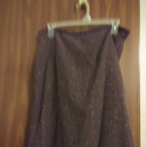 A purple knee high skirt.